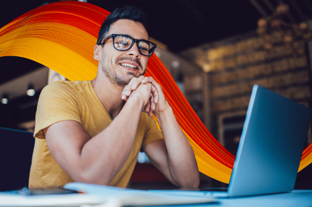 Wave+glasses+man+smiling+at+laptop