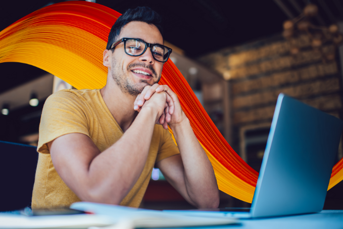 Wave+glasses+man+smiling+at+laptop